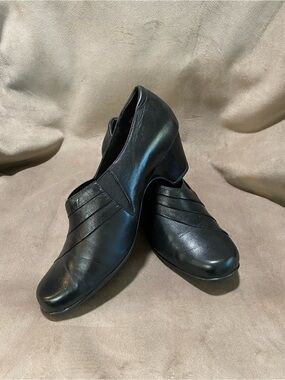 Clarks Black Leather Slip-On Ankle Booties with Subtle Strap Detail